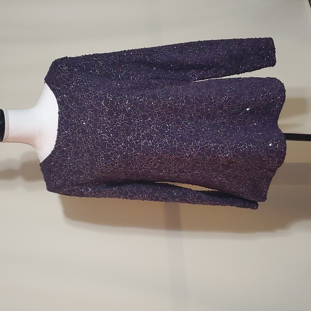 Super cute Jennifer Lopez purple top. Great for holiday parties.
